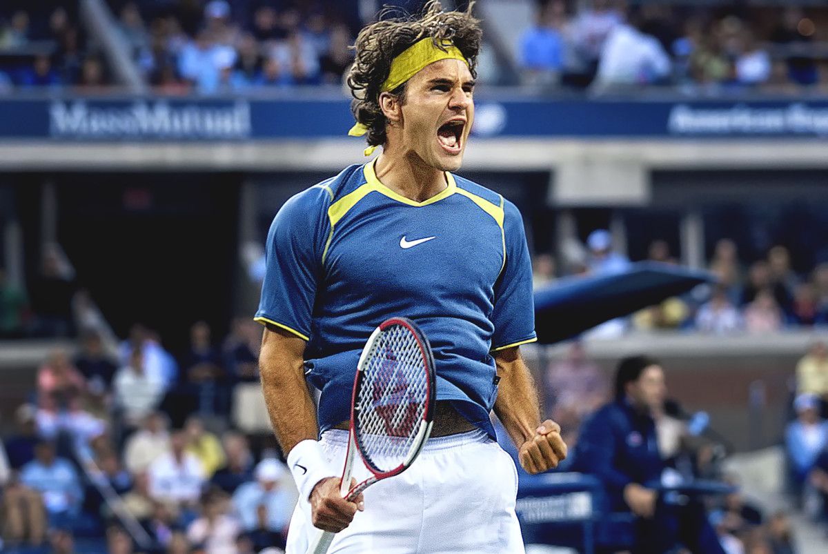 Roger Federer juicht met gebalde vuist na een belangrijk punt.
